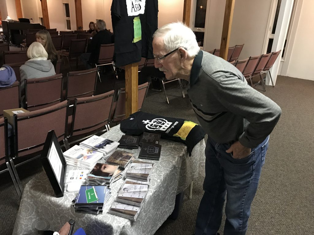 Ken Looking at Merchandise